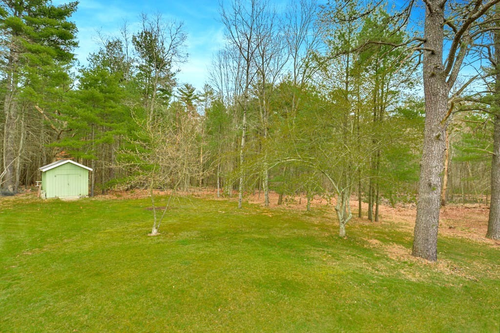 20 Oakview Circle Medway, MA 02053 - Photo 29 of 33 a view of a playground with a house in the background
