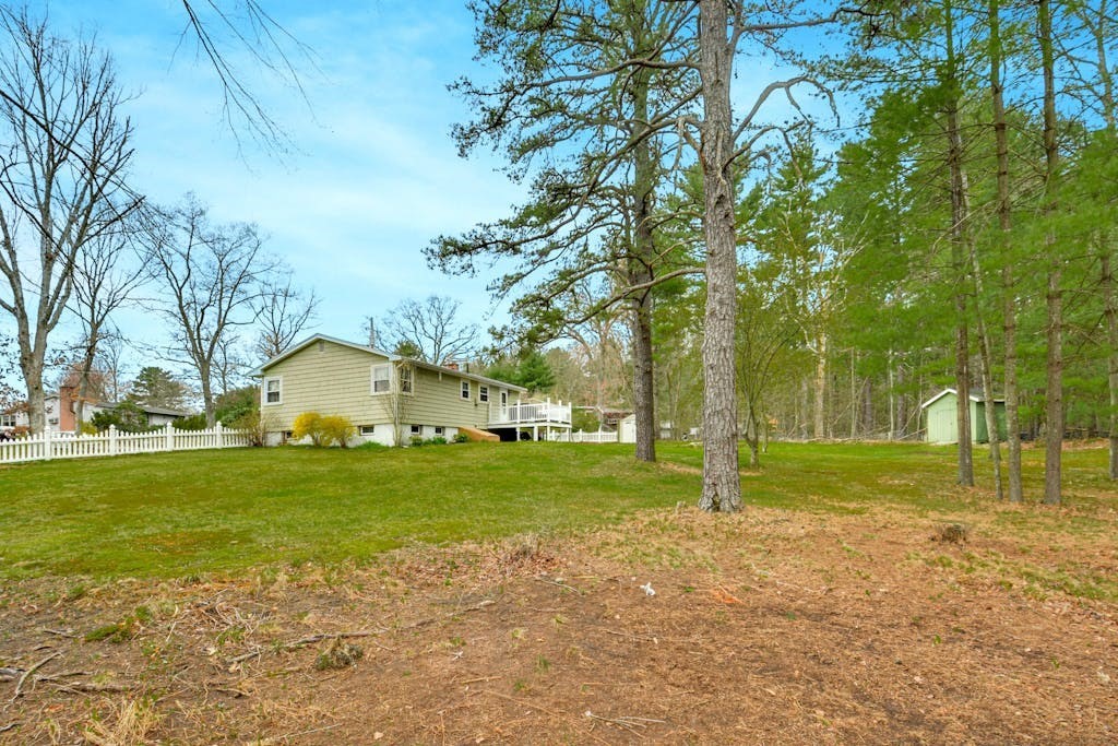 20 Oakview Circle Medway, MA 02053 - Photo 30 of 33 a view of a big yard with a house