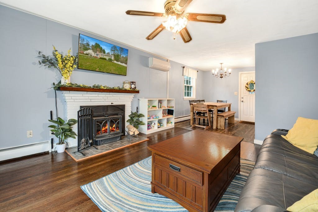 20 Oakview Circle Medway, MA 02053 - Photo 4 of 33 a living room with furniture and a fireplace