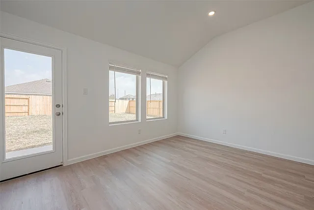 a view of kitchen with wooden floor