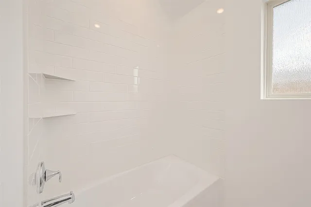 a bathroom with a bathtub