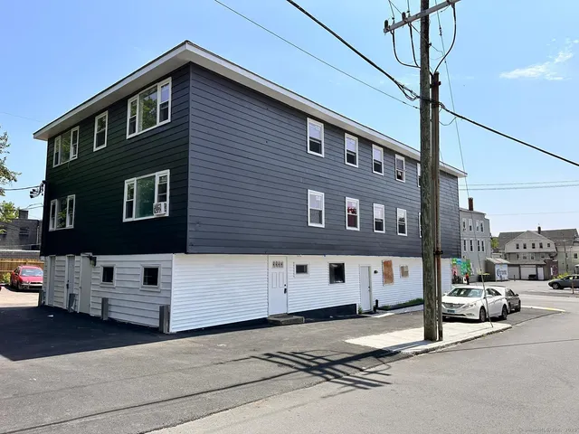 a front view of a building with street