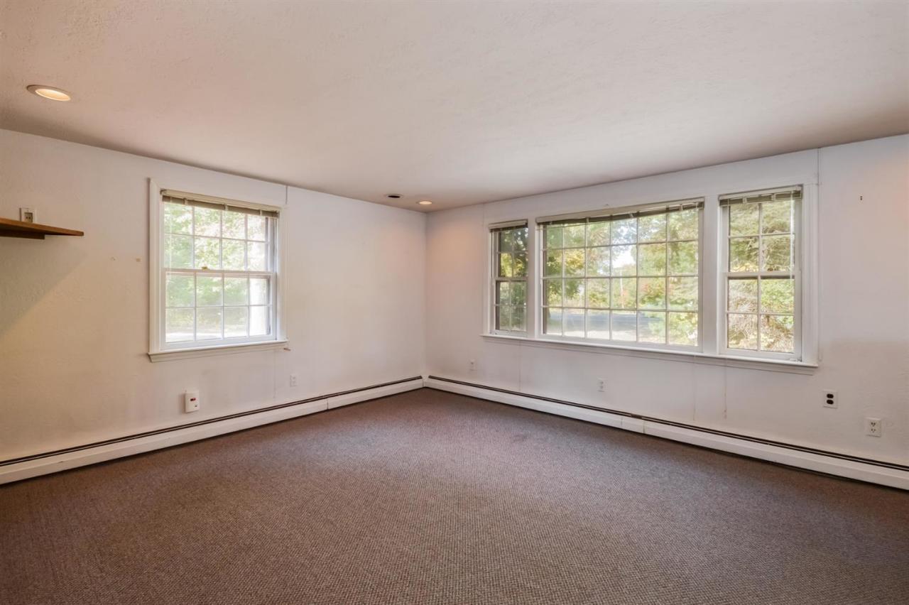 1949 Falmouth Road Centerville, MA 02632 - Photo 5 of 23 an empty room with a window
