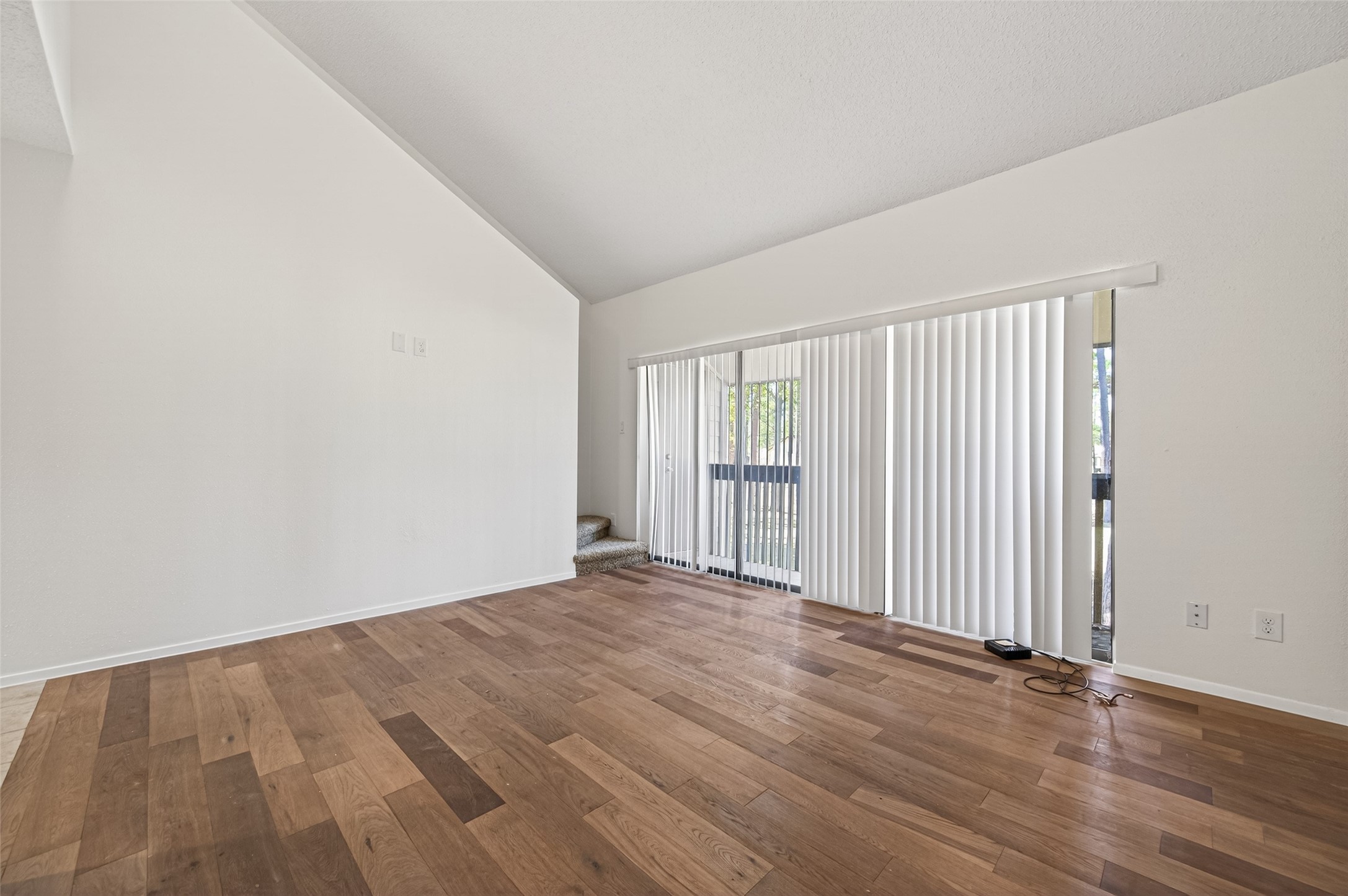 12900 Walden Road, Unit 108A Montgomery, TX 77356 - Photo 20 of 42 a view of an empty room with wooden floor