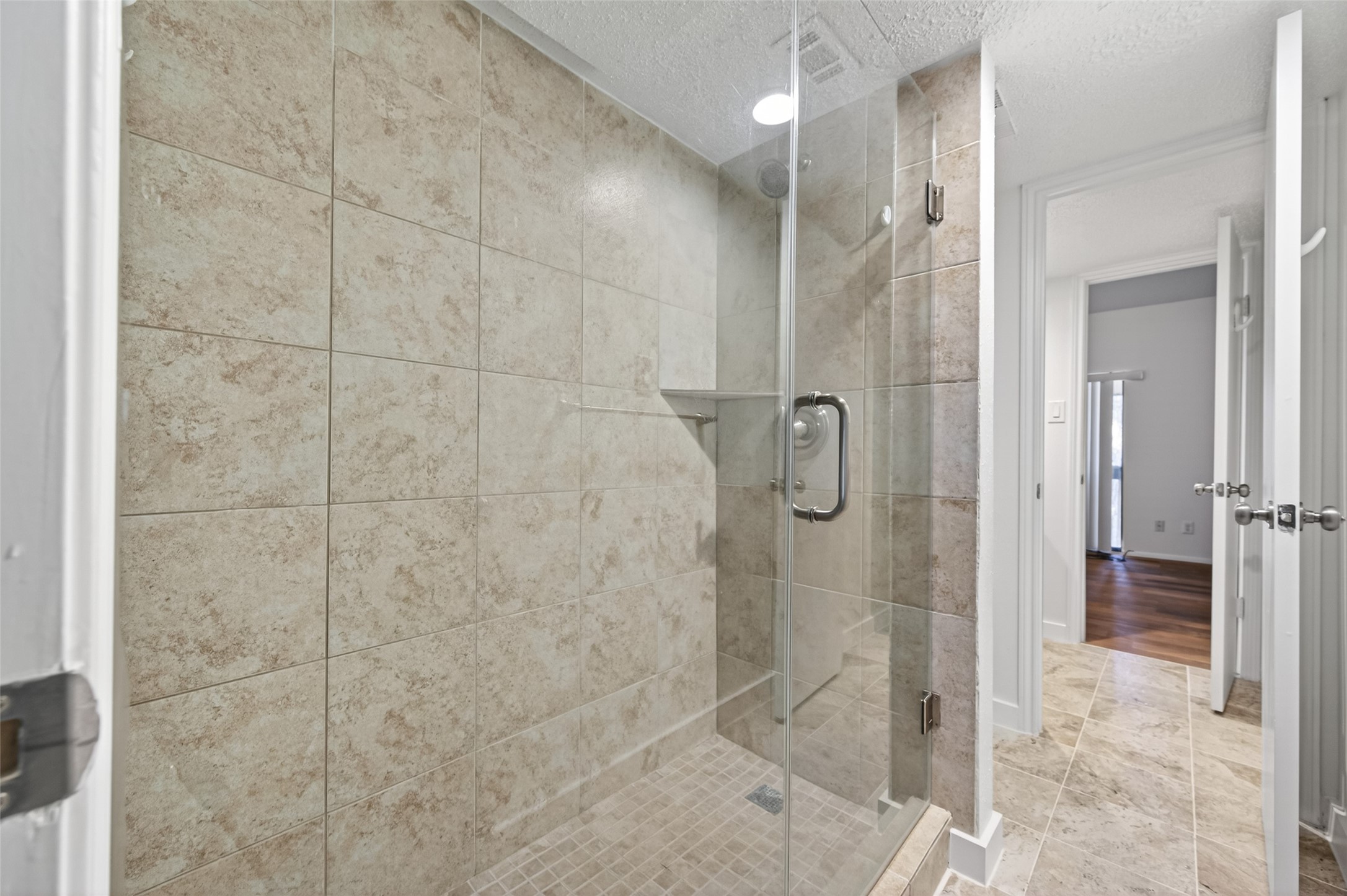 12900 Walden Road, Unit 108A Montgomery, TX 77356 - Photo 25 of 42 a bathroom with a shower and a sink