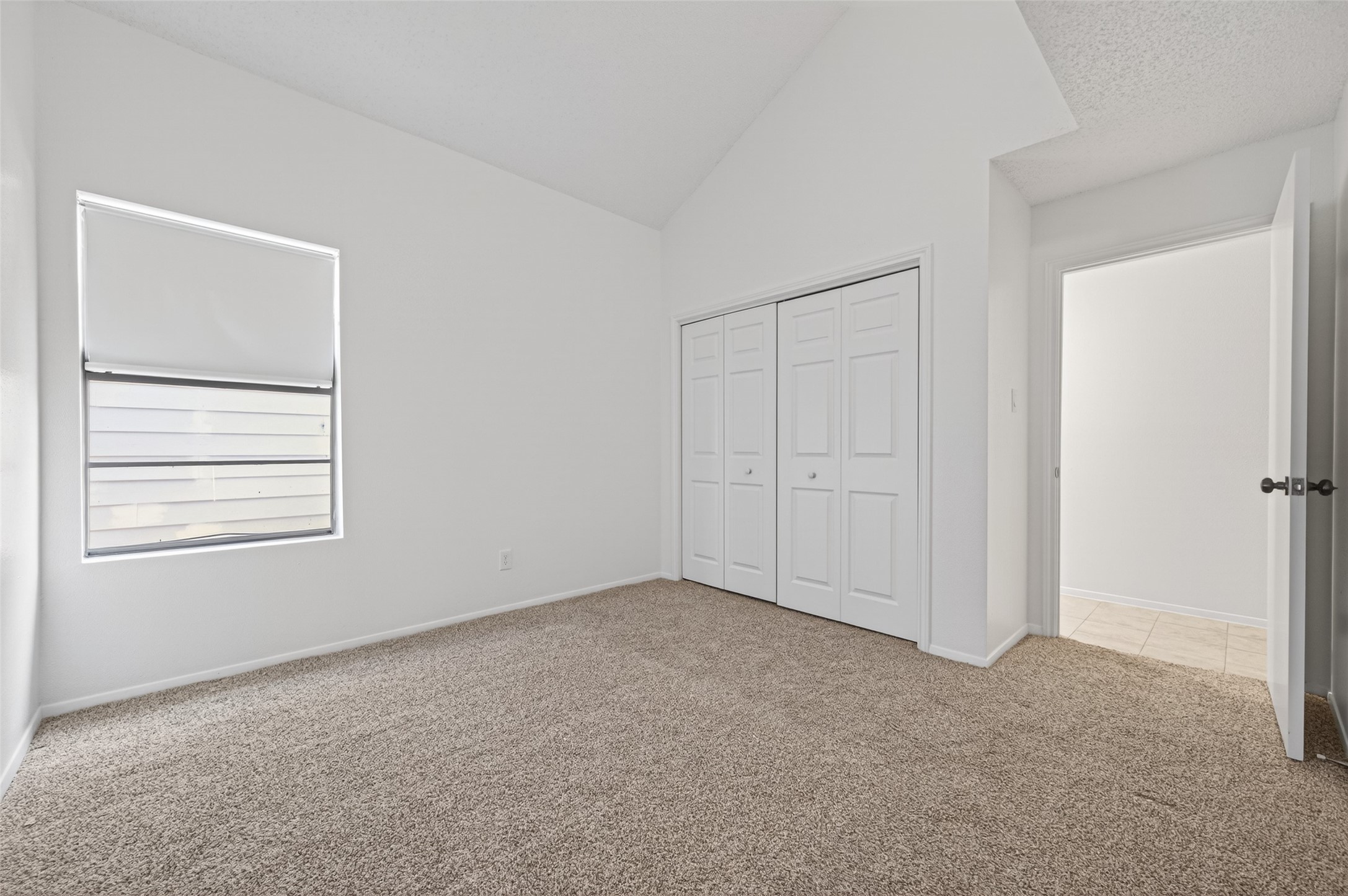 12900 Walden Road, Unit 108A Montgomery, TX 77356 - Photo 26 of 42 a view of an empty room with a window
