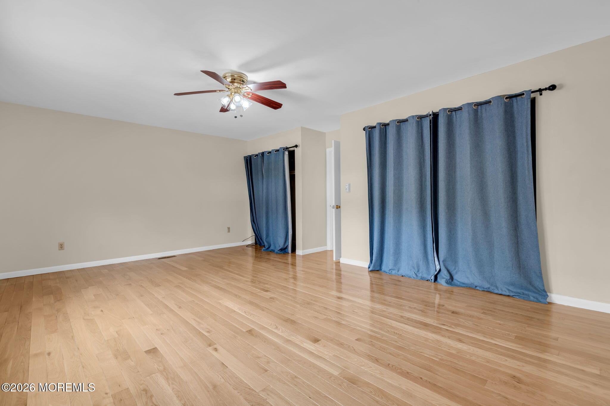 633 Randall Way Aberdeen, NJ 07747 - Photo 22 of 28 a view of an empty room with wooden floor