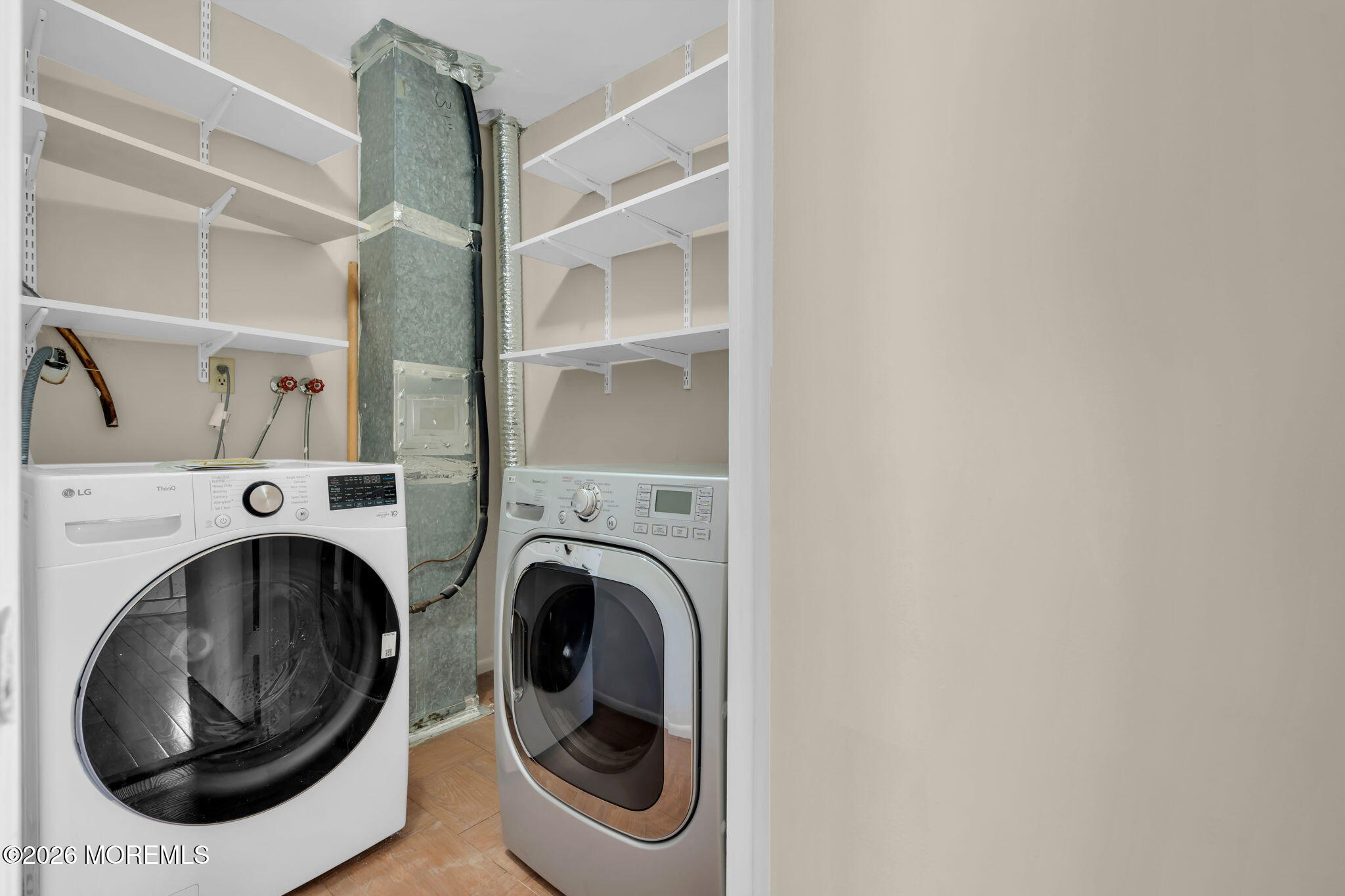 633 Randall Way Aberdeen, NJ 07747 - Photo 23 of 28 a utility room with dryer and washer