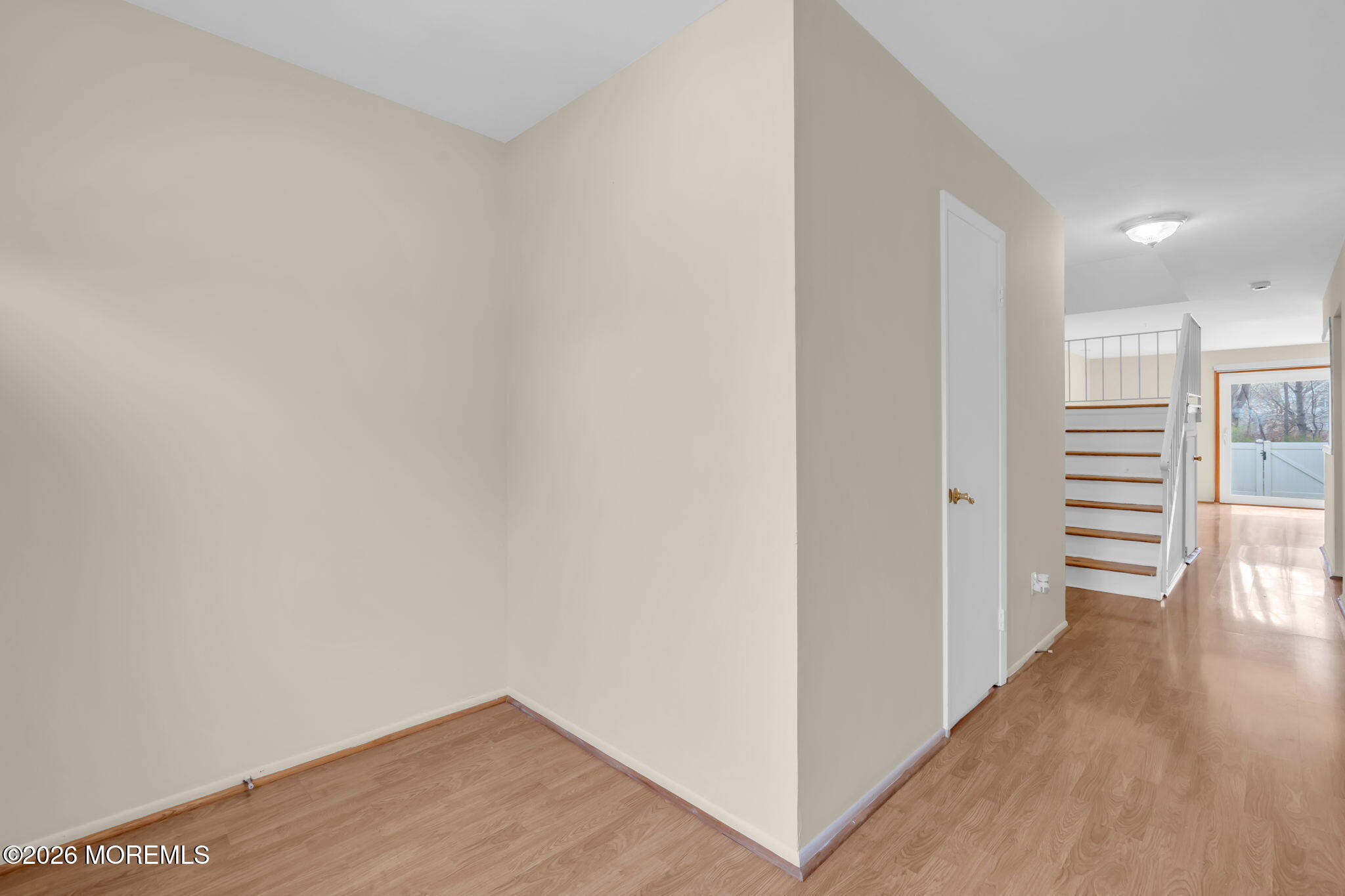 633 Randall Way Aberdeen, NJ 07747 - Photo 5 of 28 a view of empty room with wooden floor