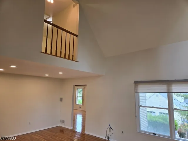 a view of backyard with a deck