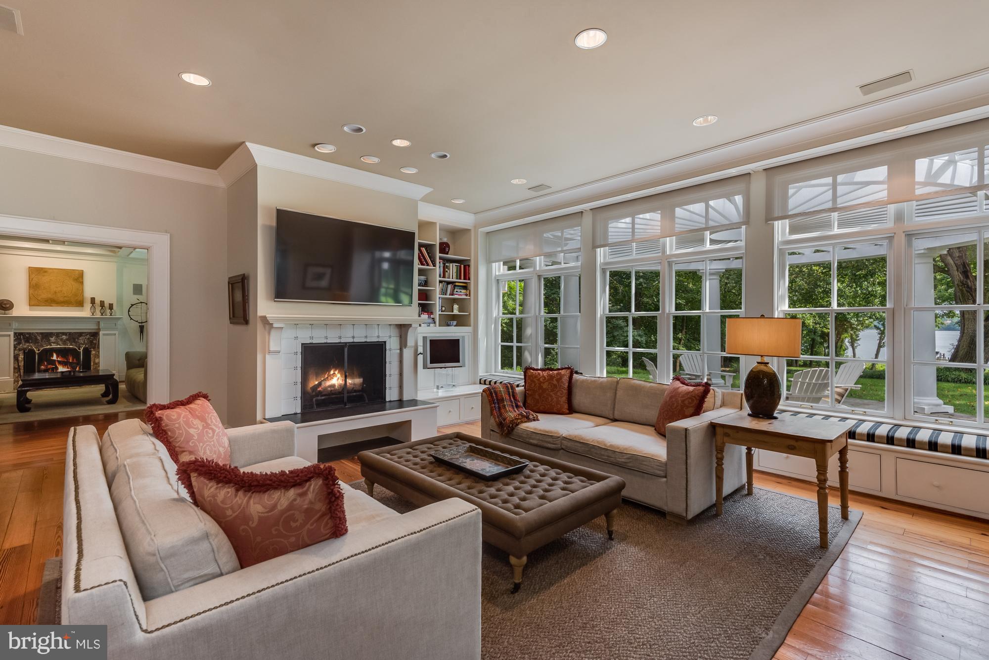30 Shadow Point Court Edgewater, MD 21037 - Photo 9 of 28 Family Room with fireplace and water views