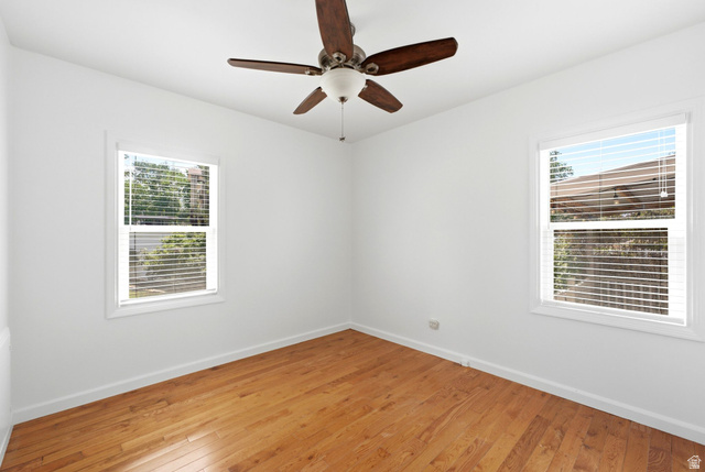 1925 South Main Street Bountiful, UT 84010 - Photo 16 of 48 Interior space featuring wood-finish flooring and white baseboards