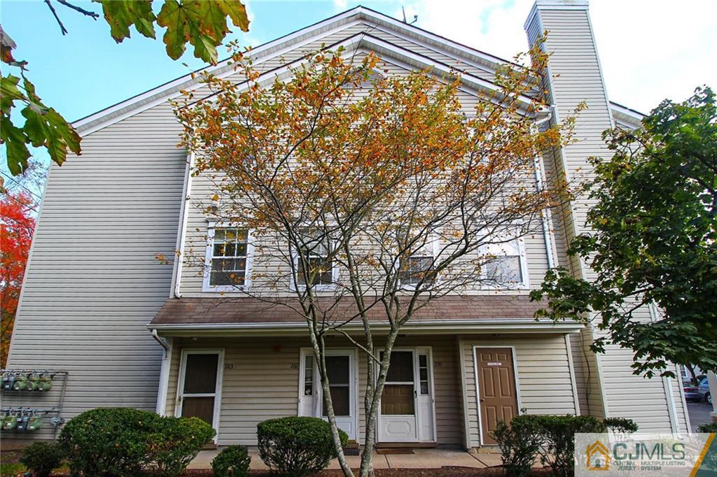 263 Prestwick Way, Unit 263 Edison, NJ 08820 - Photo 1 of 23 a view of a house with a backyard