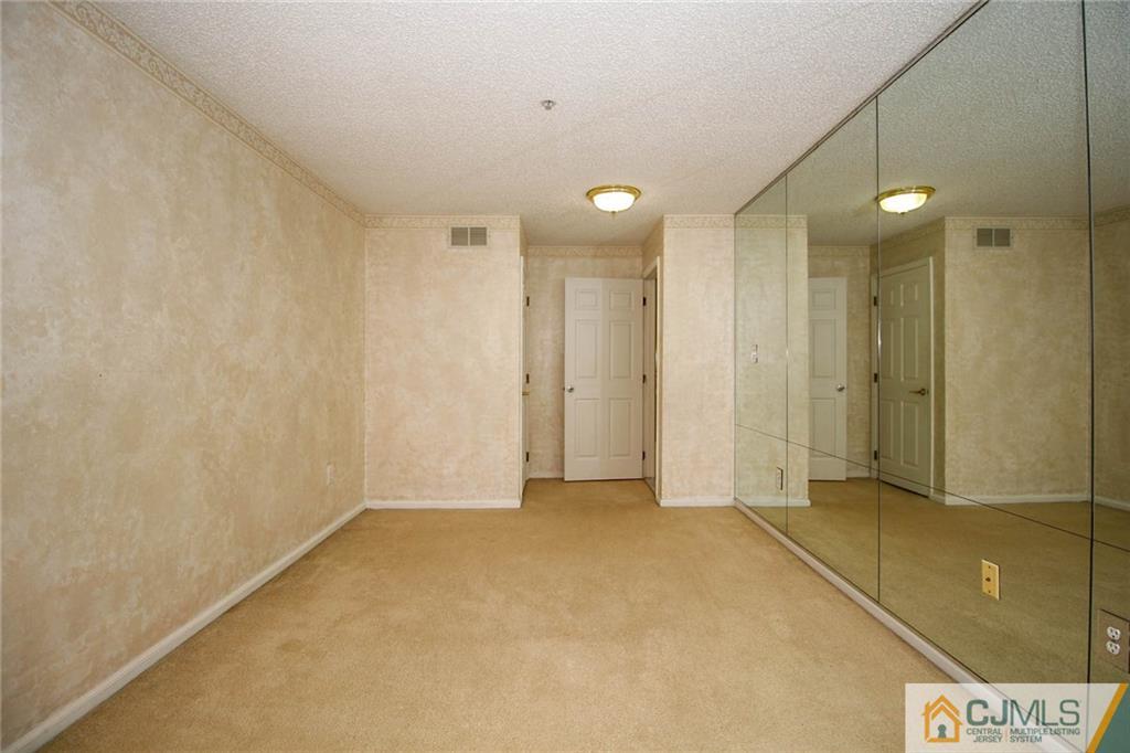 263 Prestwick Way, Unit 263 Edison, NJ 08820 - Photo 15 of 23 a view of an empty room