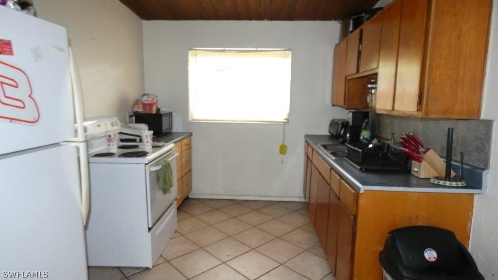 4519 Luckett Road Fort Myers, FL 33905 - Photo 13 of 26 a room with storage and utility