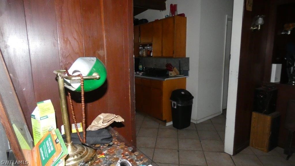 4519 Luckett Road Fort Myers, FL 33905 - Photo 15 of 26 a workspace with furniture and a potted plant