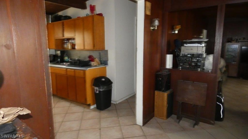4519 Luckett Road Fort Myers, FL 33905 - Photo 16 of 26 a kitchen with stainless steel appliances granite countertop a refrigerator and a stove