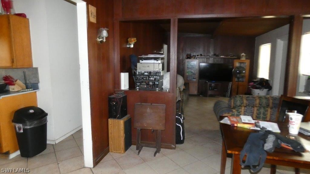4519 Luckett Road Fort Myers, FL 33905 - Photo 17 of 26 a dining room with furniture and a window
