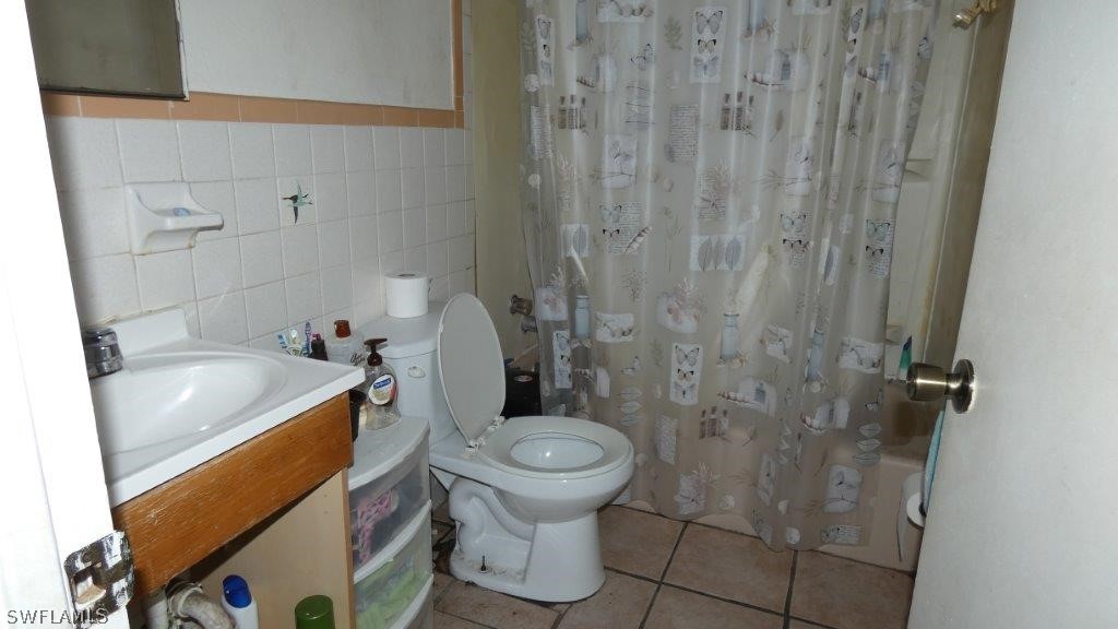 4519 Luckett Road Fort Myers, FL 33905 - Photo 22 of 26 a bathroom with a sink and toilet