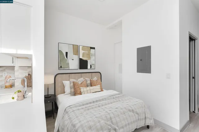 a bedroom with a bed and window