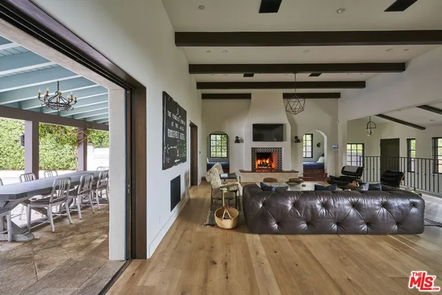 a view of a chairs and table in a patio