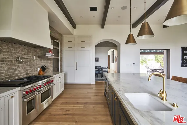 a view of a livingroom with furniture and window