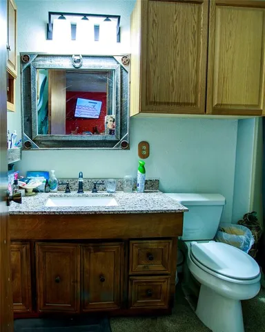 a bed sitting in a room next to a window