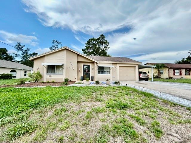 3205 Harrow Road Spring Hill, FL 34606 - Photo 1 of 14