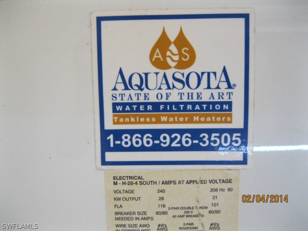 18225 Fuchsia Road Fort Myers, FL 33967 - Photo 13 of 23 a sign on the wall of the room