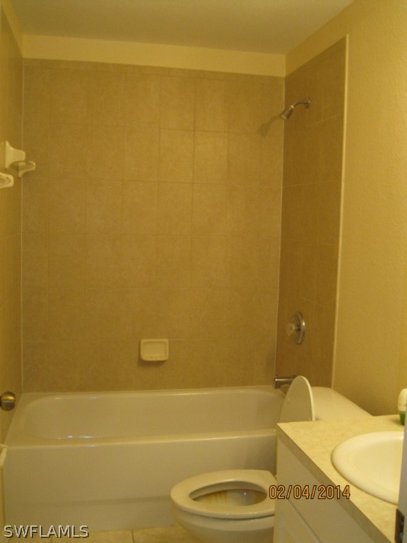 18225 Fuchsia Road Fort Myers, FL 33967 - Photo 10 of 23 a bathroom with a bathtub and a shower