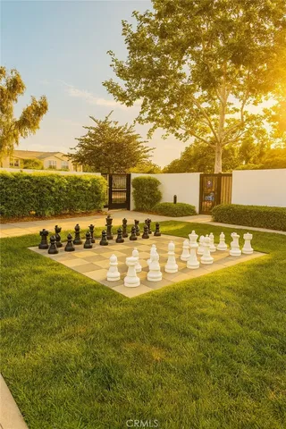 a view of a kitchen with a table and chairs