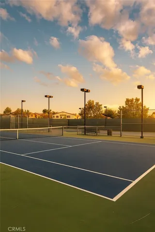a view of a golf course with a ocean view