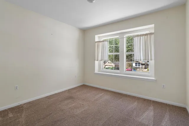 an empty room with window