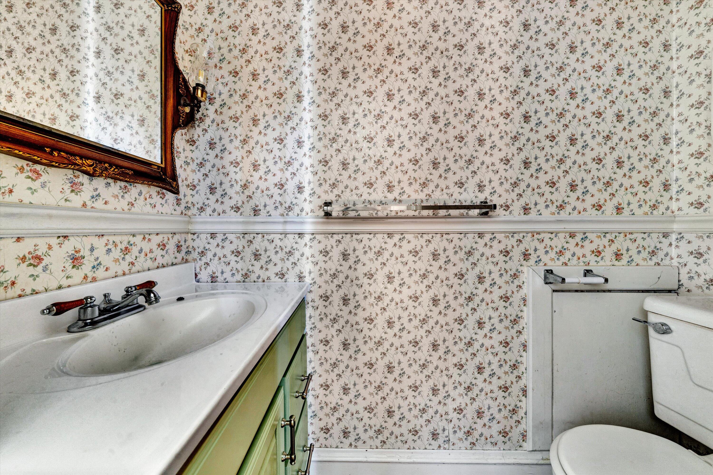 2744 Highland Road Roanoke, VA 24014 - Photo 18 of 29 a bathroom with a sink and a toilet