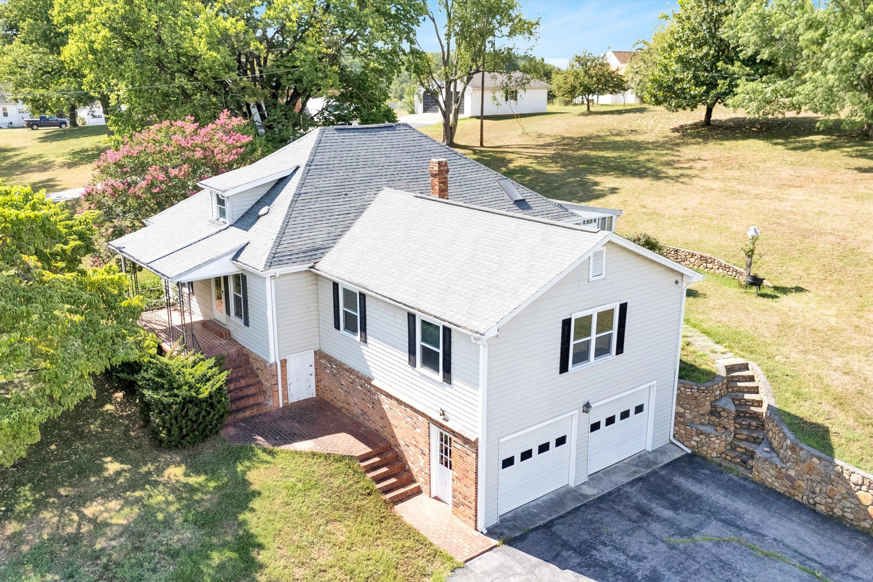 2744 Highland Road Roanoke, VA 24014 - Photo 2 of 29 a aerial view of a house with a yard