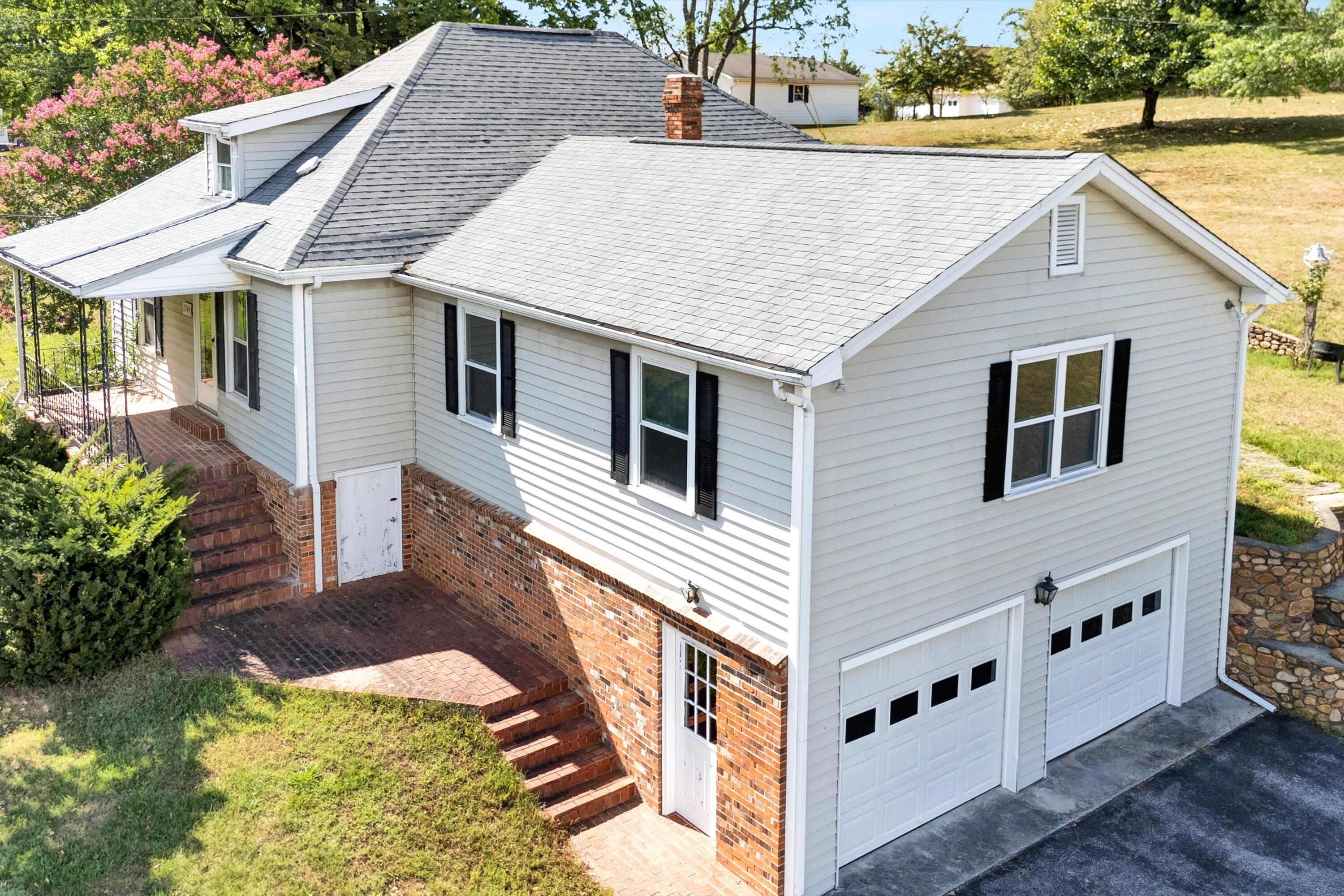 2744 Highland Road Roanoke, VA 24014 - Photo 21 of 29 a aerial view of a house with yard and sitting area