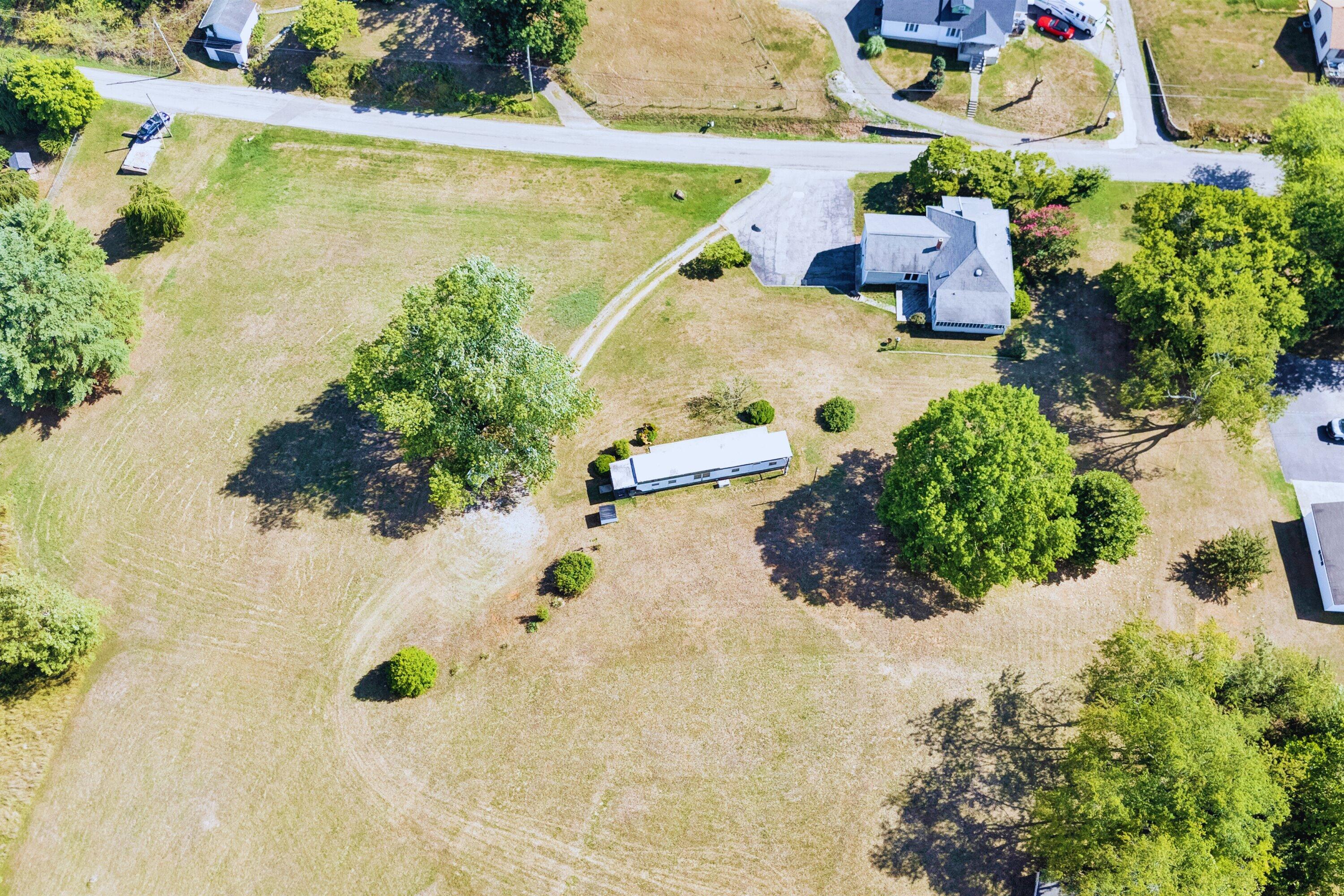 2744 Highland Road Roanoke, VA 24014 - Photo 24 of 29 an aerial view of residential houses with outdoor space