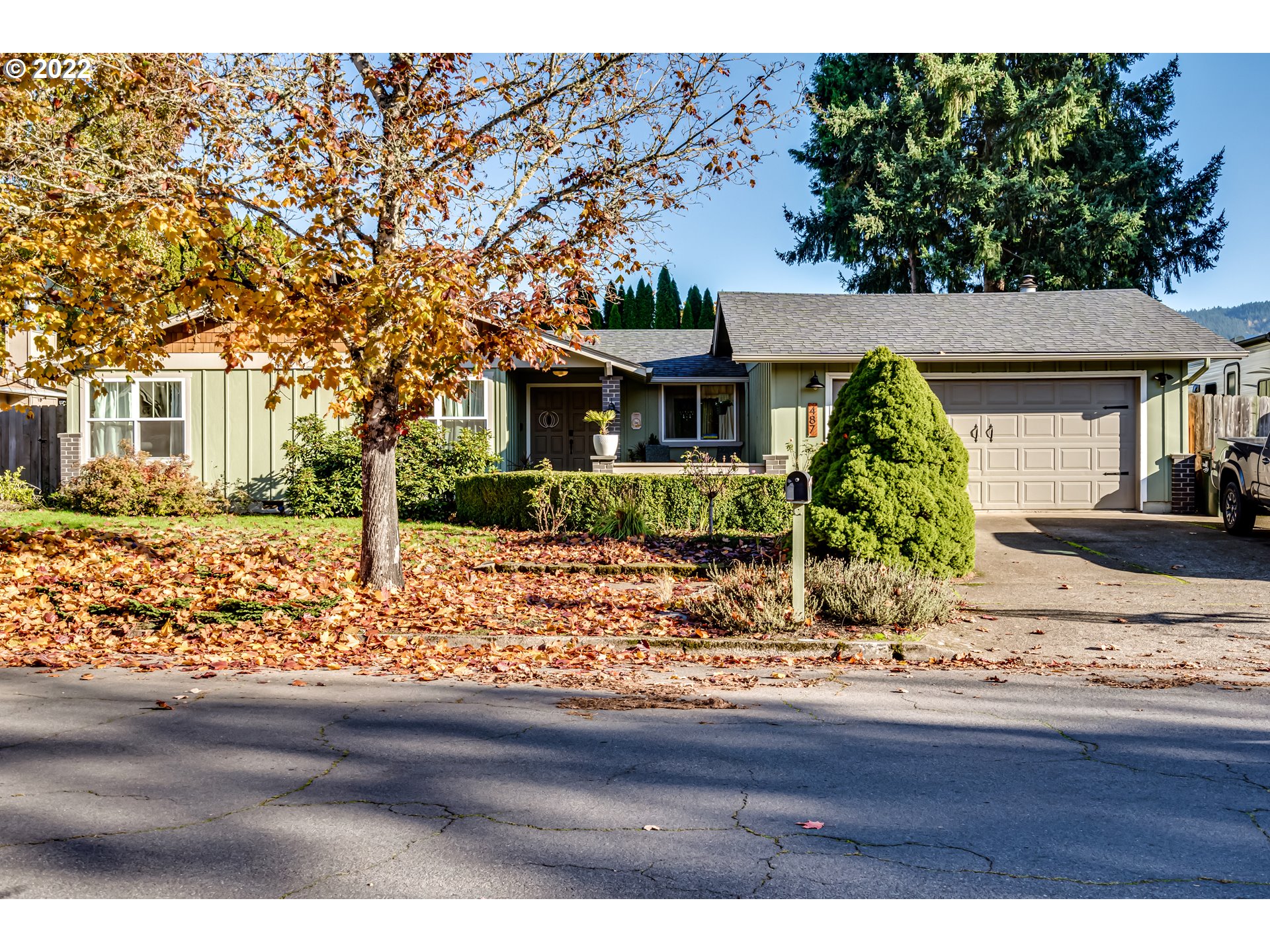 487 65th Street Springfield, OR 97478 - Photo 1 of 20 front view of house with a street