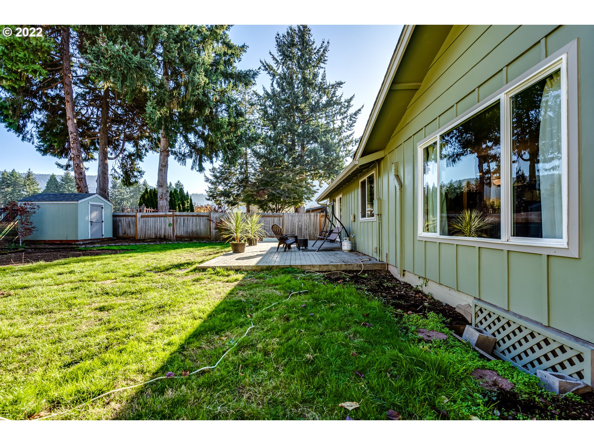 487 65th Street Springfield, OR 97478 - Photo 19 of 20 a view of a house with a backyard