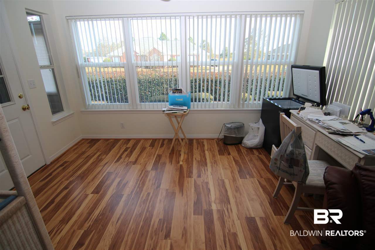 9592 Villas Drive, Unit 21B Foley, AL 36535 - Photo 17 of 25 Sunroom