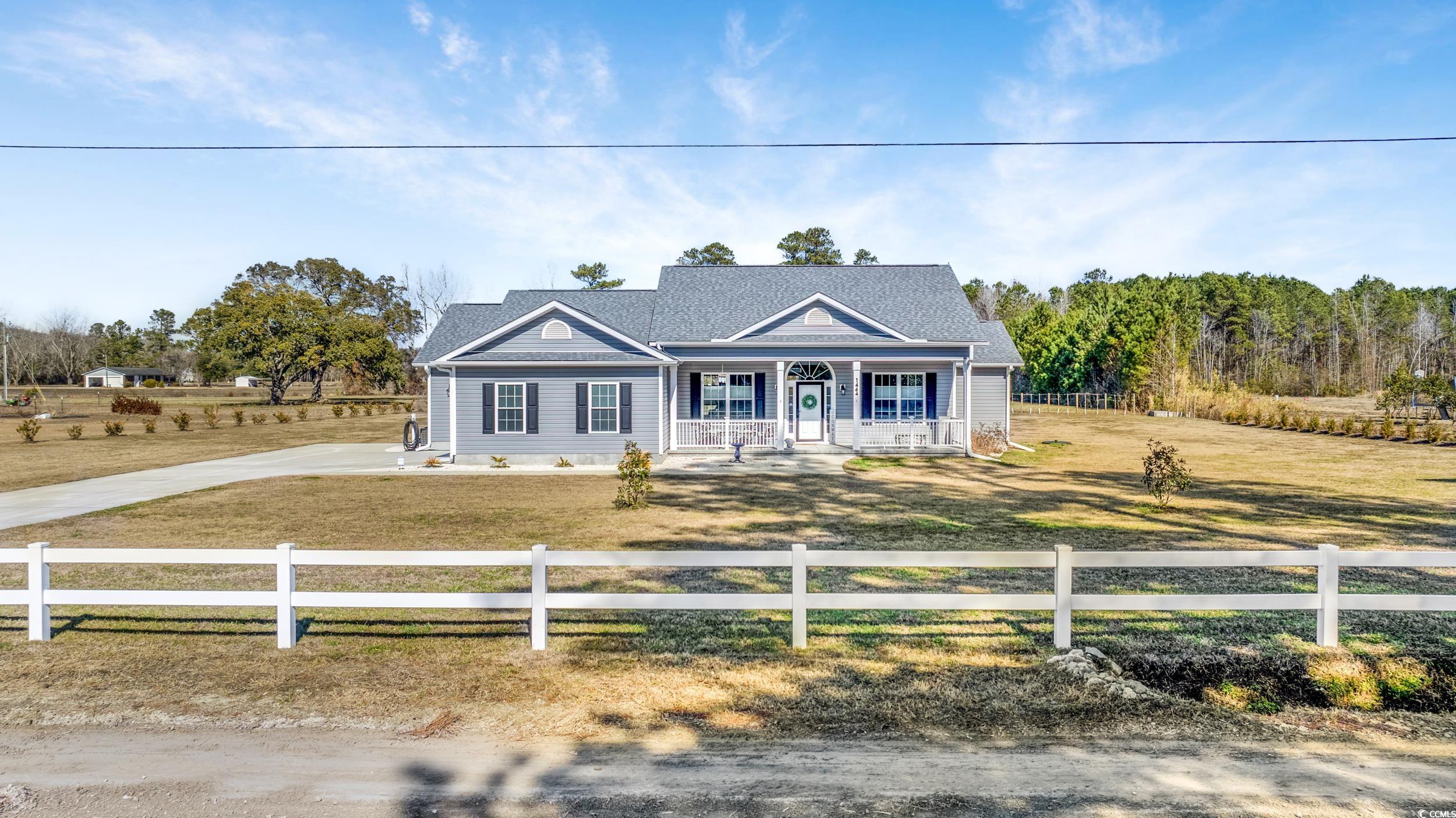 1464 West G Road Conway, SC 29526 - Photo 1 of 40 Craftsman-style home with a rural view and covered