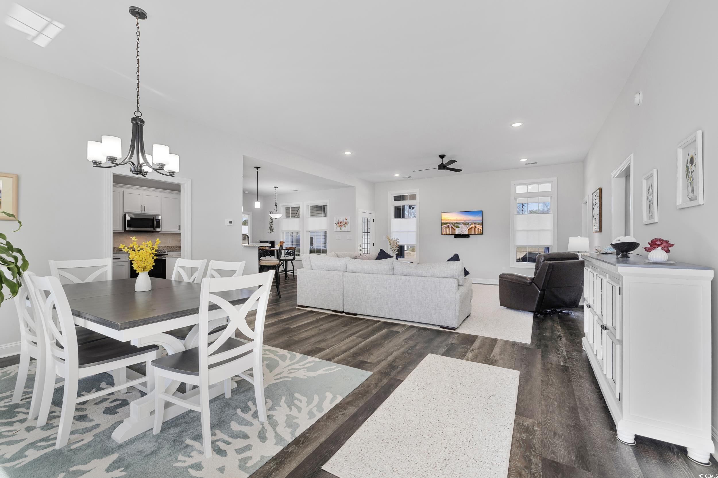 1464 West G Road Conway, SC 29526 - Photo 9 of 40 Dining space featuring dark wood-type flooring and