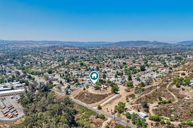 a view of an entryway with livingroom
