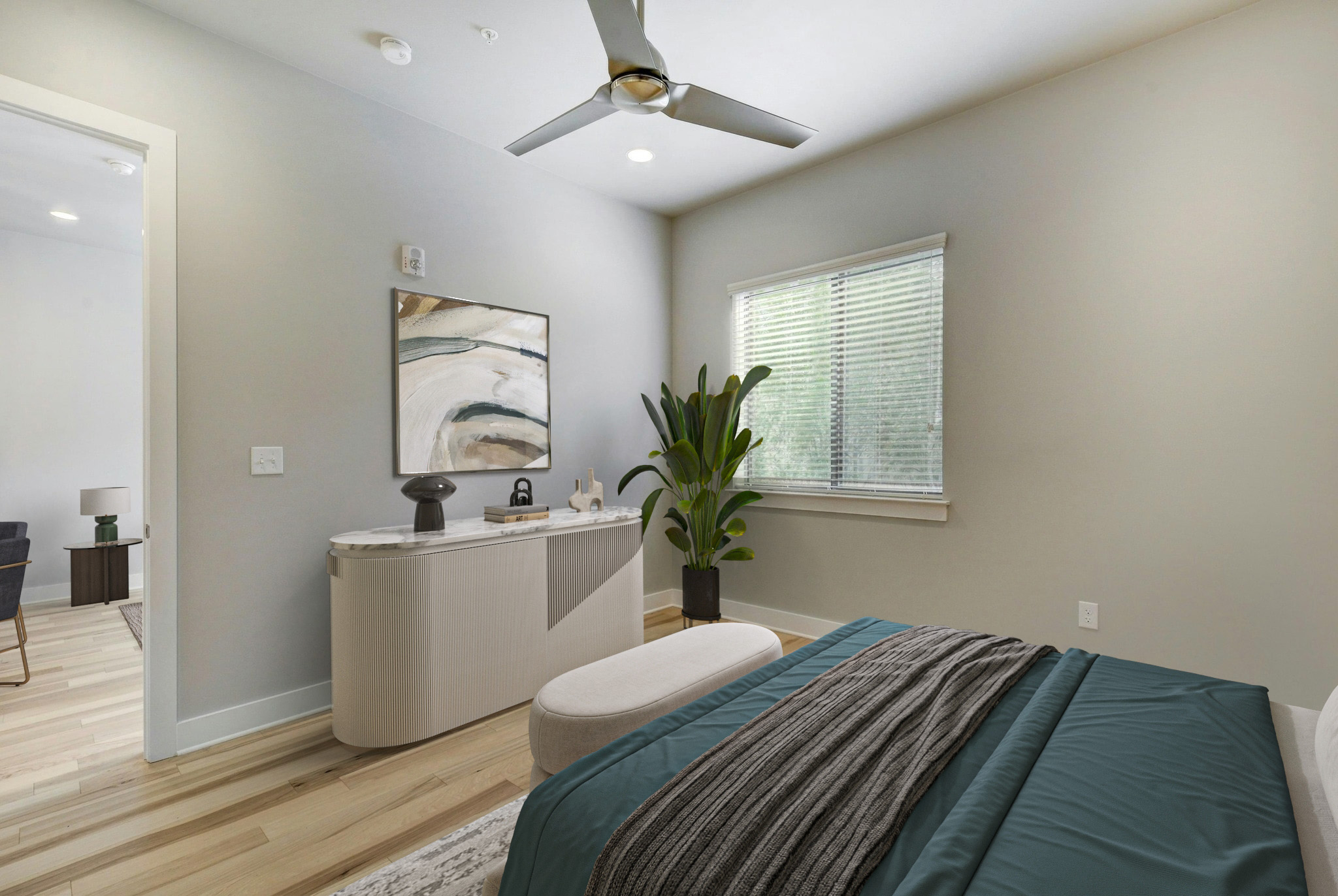 2314 Enfield Road, Unit 202 Austin, TX 78703 - Photo 8 of 20 Natural light illuminates this bedroom, offering wood flooring and a modern ceiling fan.