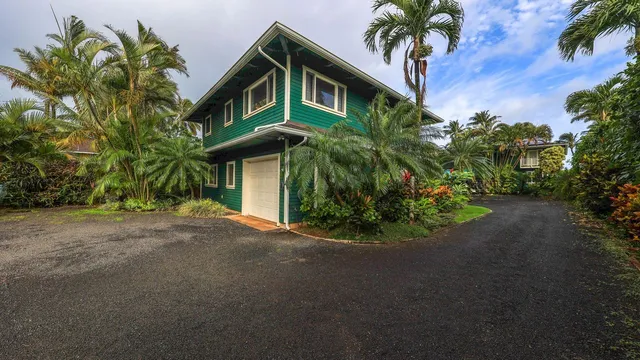 a kitchen with a sink and a refrigerator