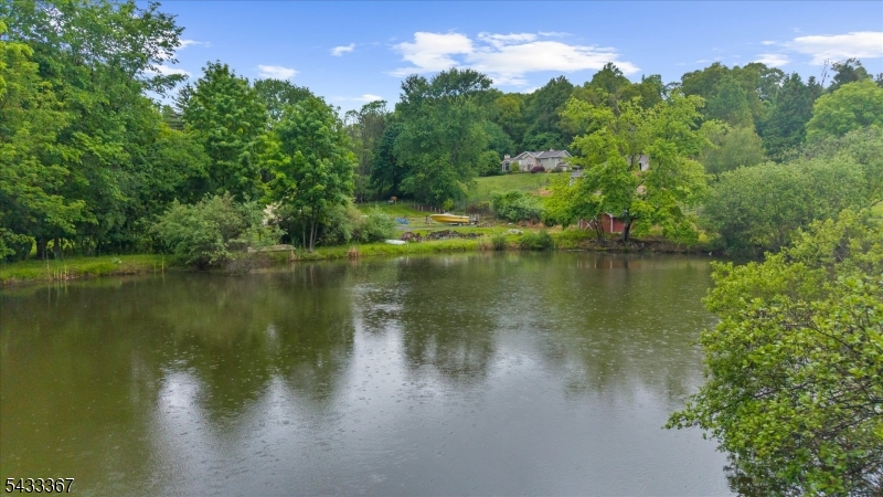 650 Woodglen Road Glen Gardner, NJ 08826 - Photo 21 of 28 a view of a lake in between two of trees