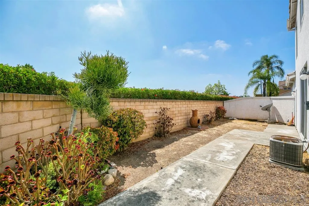 8727 Westmore Road, Unit 5 San Diego, CA 92126 - Photo 13 of 14 a view of a lake with outdoor space