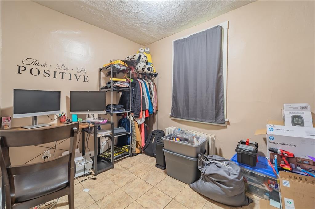 624 Frayne Street Pittsburgh, PA 15207 - Photo 11 of 21 a view of a workspace with furniture