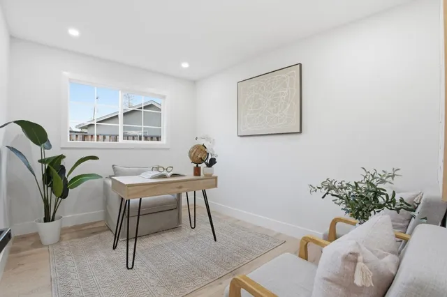a view of a dining room with furniture
