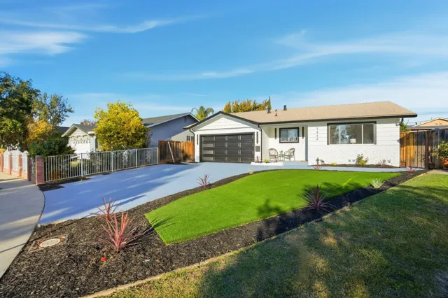 a view of a backyard with a slide